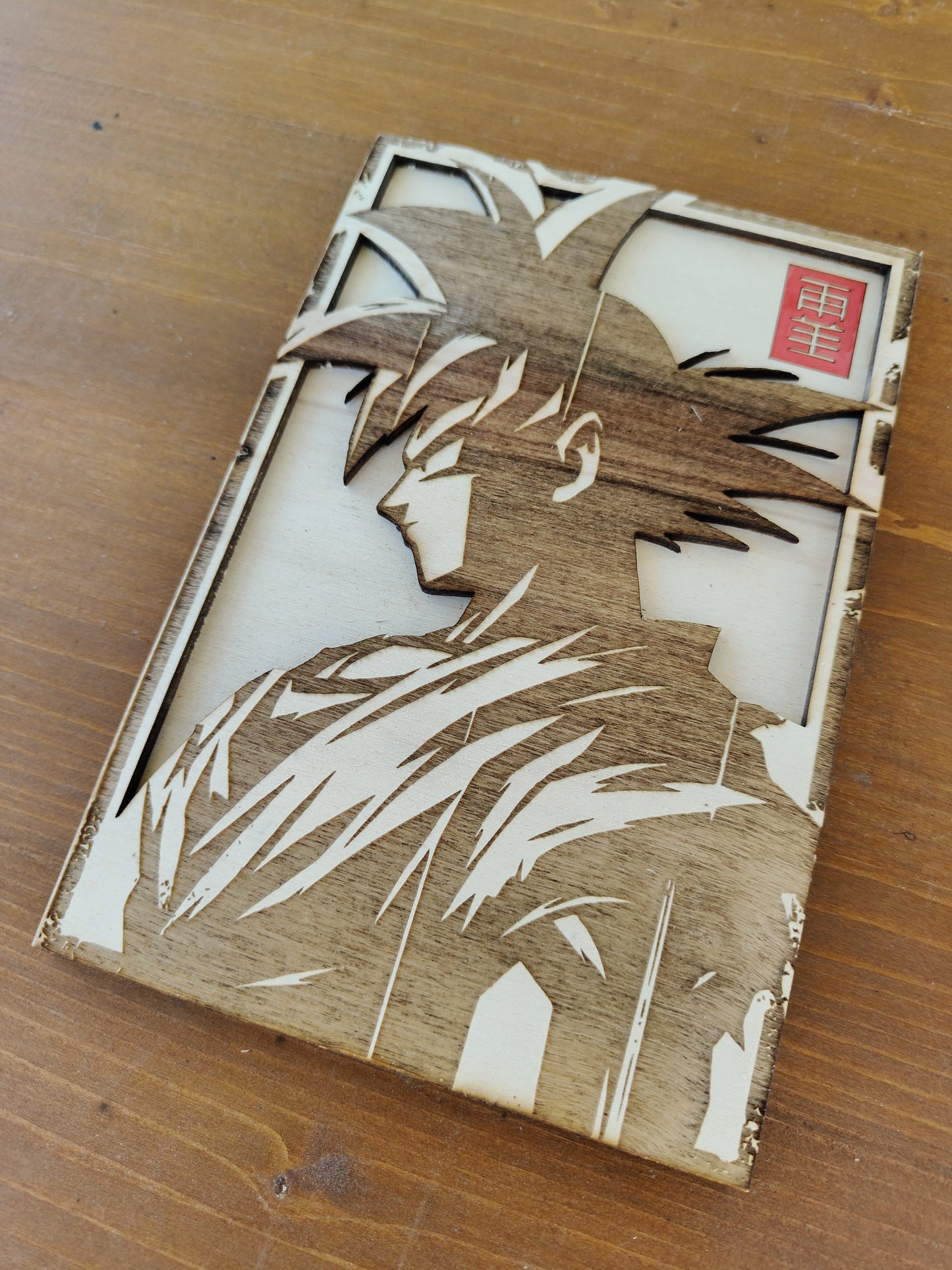 Quadretto Dragon Ball Goku silhouette in legno inciso laser